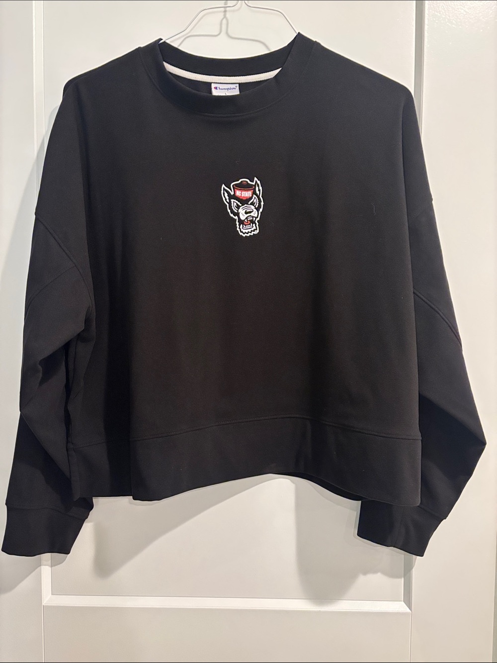 Champion Women’s Long Sleeve Crewneck Sweatshirt with NC State logo Large